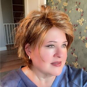 Elegant Strawberry Blonde wig by WIG PRO.